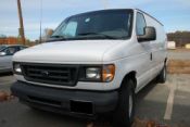 2003 Ford E150 cargo van with work bins